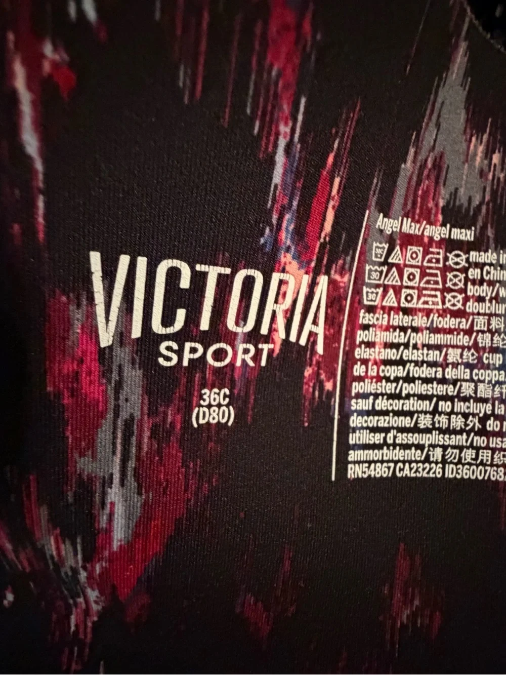 Victoria Sport Printed High-Support Sports Bra in Black with Pink & Blue Accents